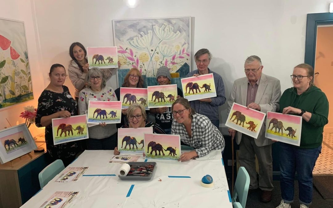 brighouse art group holding paintings